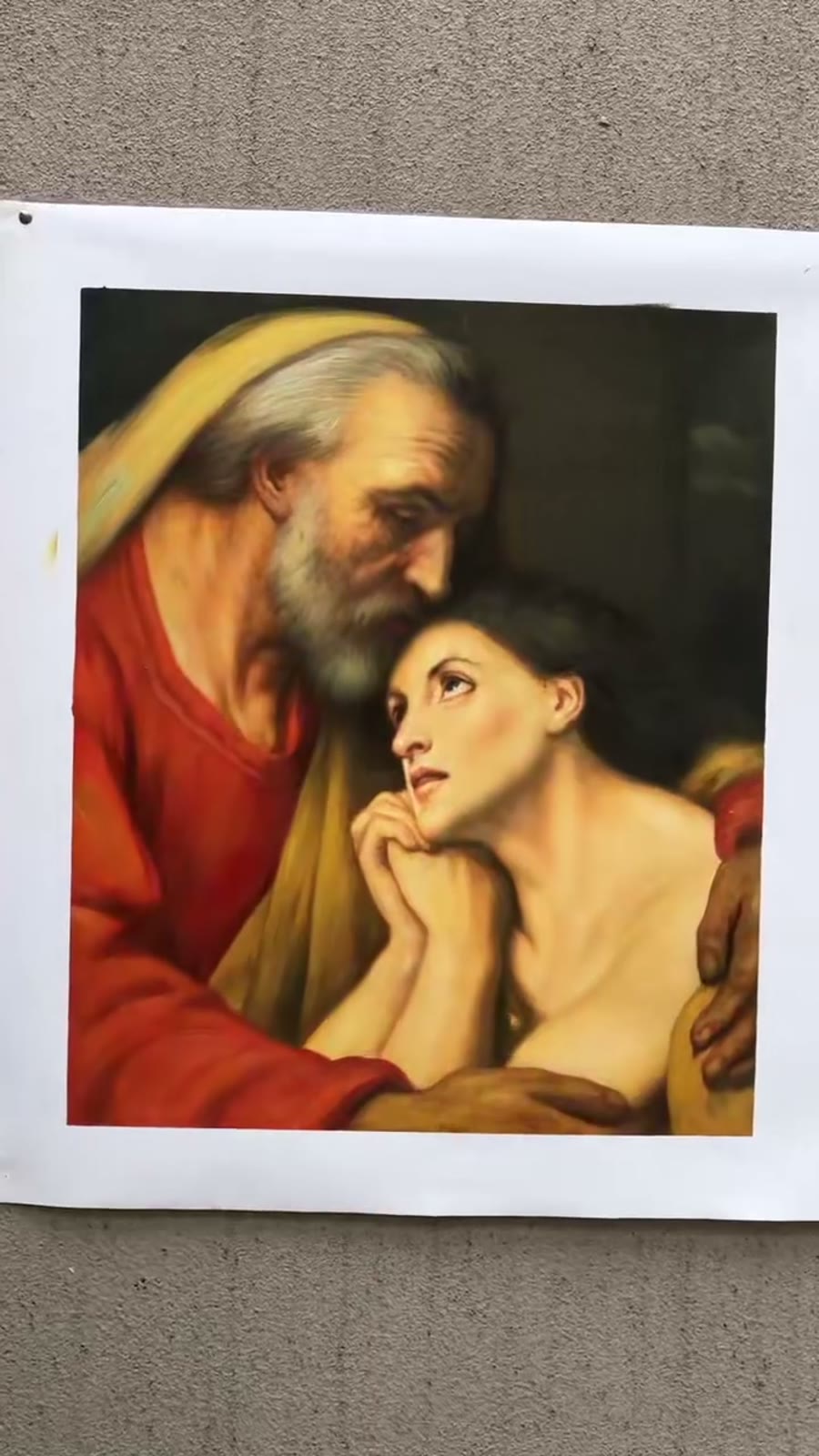 Peinture biblique en cours de réalisation dans un atelier partenaire